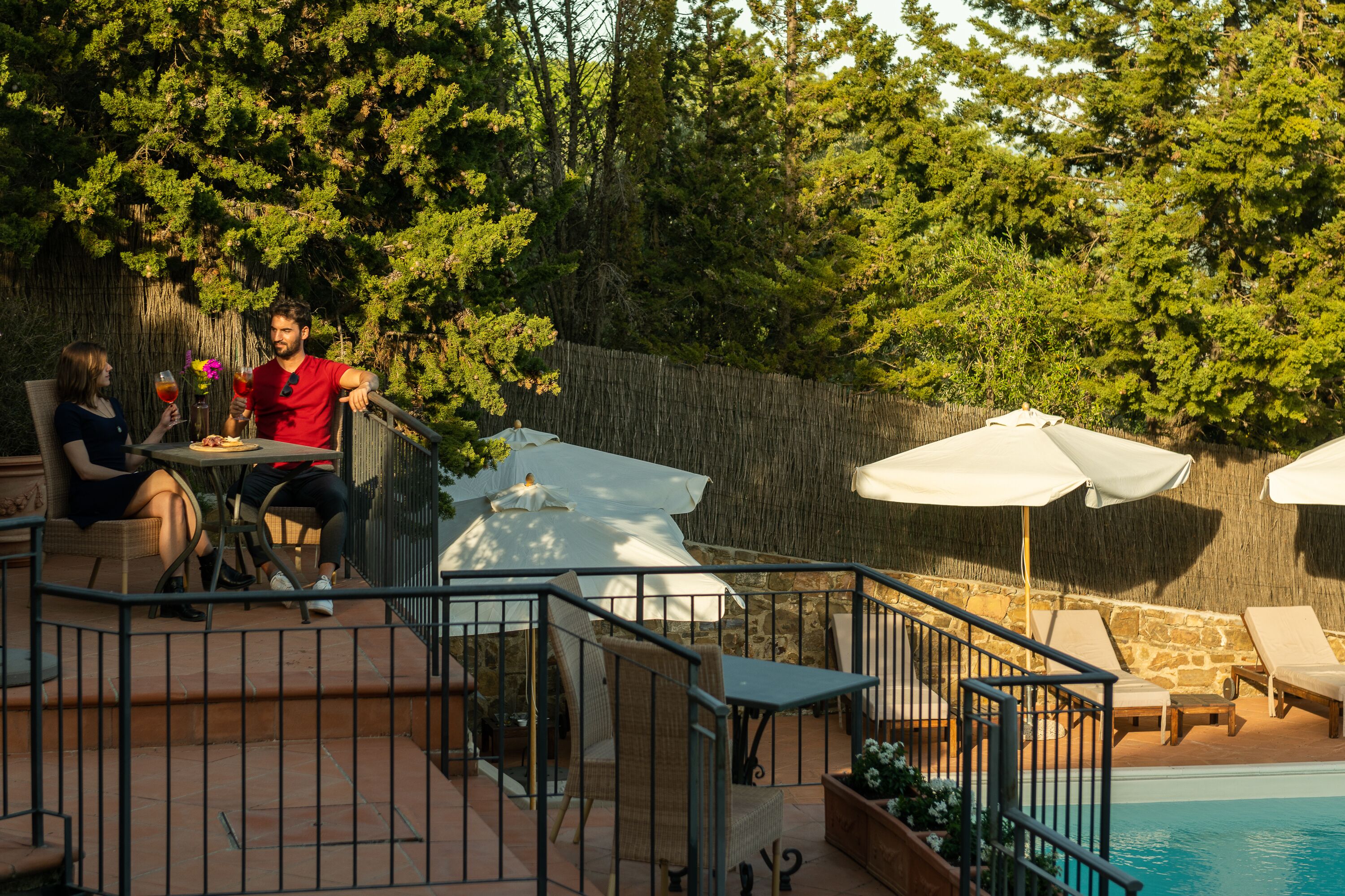 seasonal outdoor pool, open 9:30 am to 7:00 pm, pool umbrellas