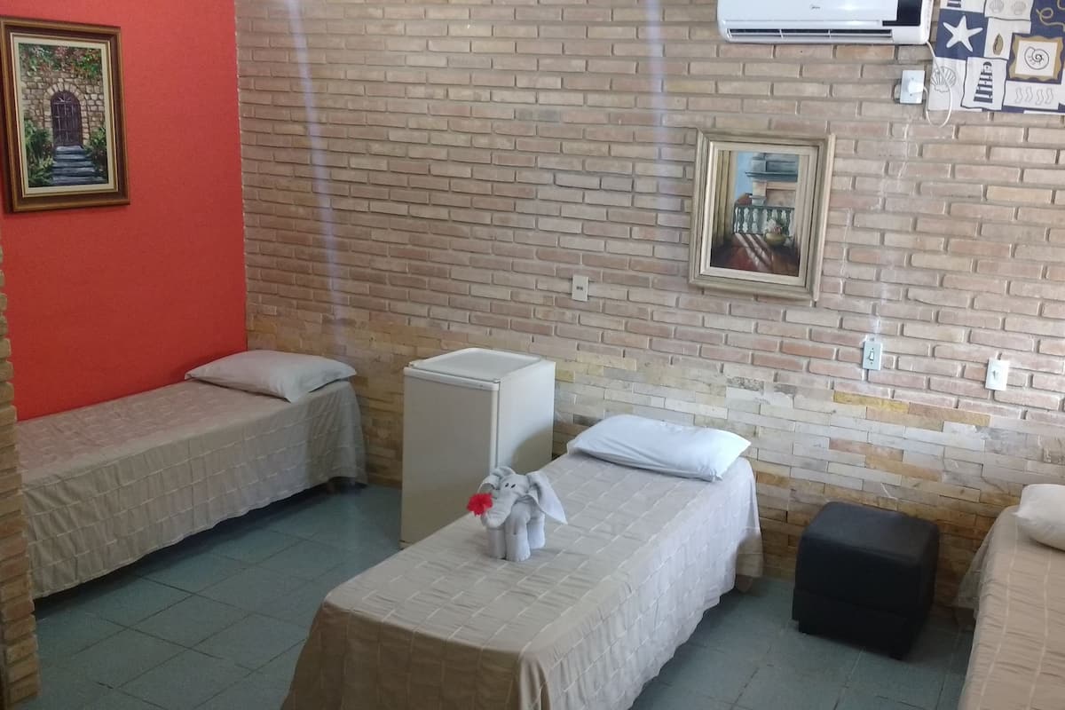 Standard Triple Room | Minibar, individually decorated, individually furnished, free WiFi