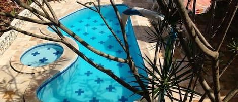 Outdoor pool, pool umbrellas, sun loungers