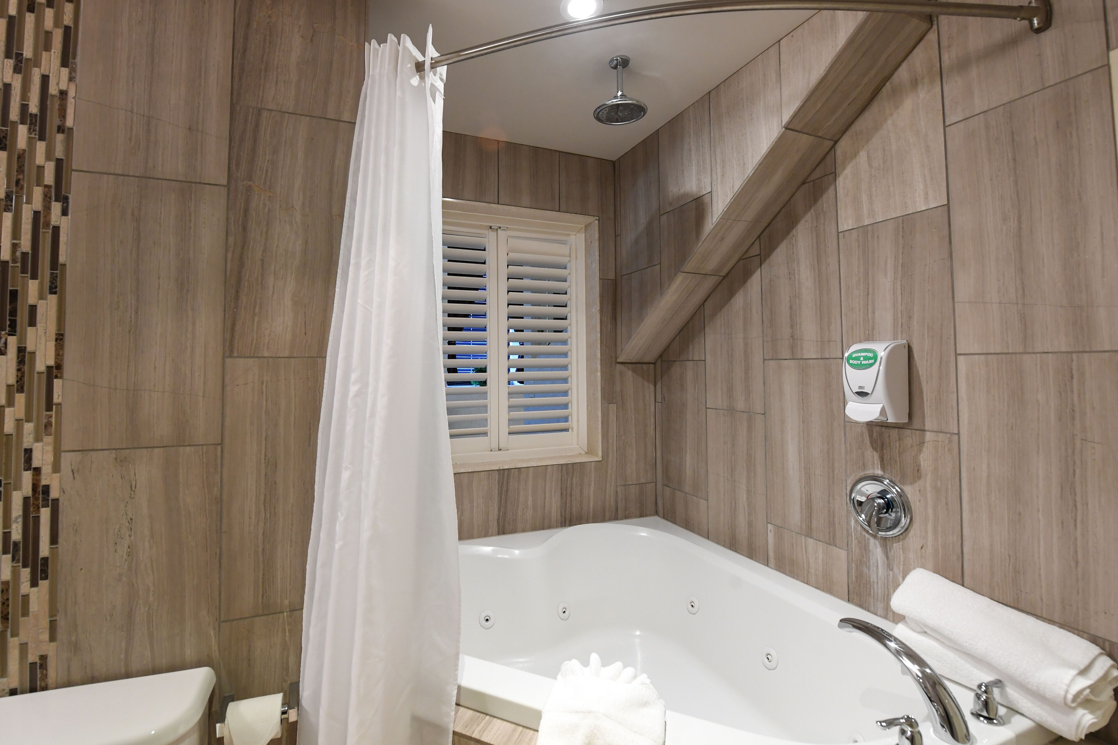 2-storey loft suite | bathroom | free toiletries, hair dryer, towels, soap