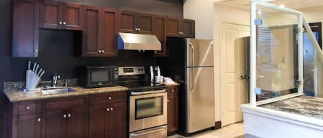 2-Storey Loft Suite | Private kitchen | Fridge, microwave, coffee/tea maker