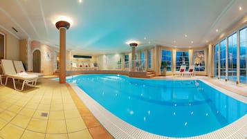 Indoor pool, pool umbrellas, sun loungers