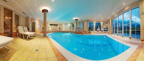 Indoor pool, pool umbrellas, sun loungers