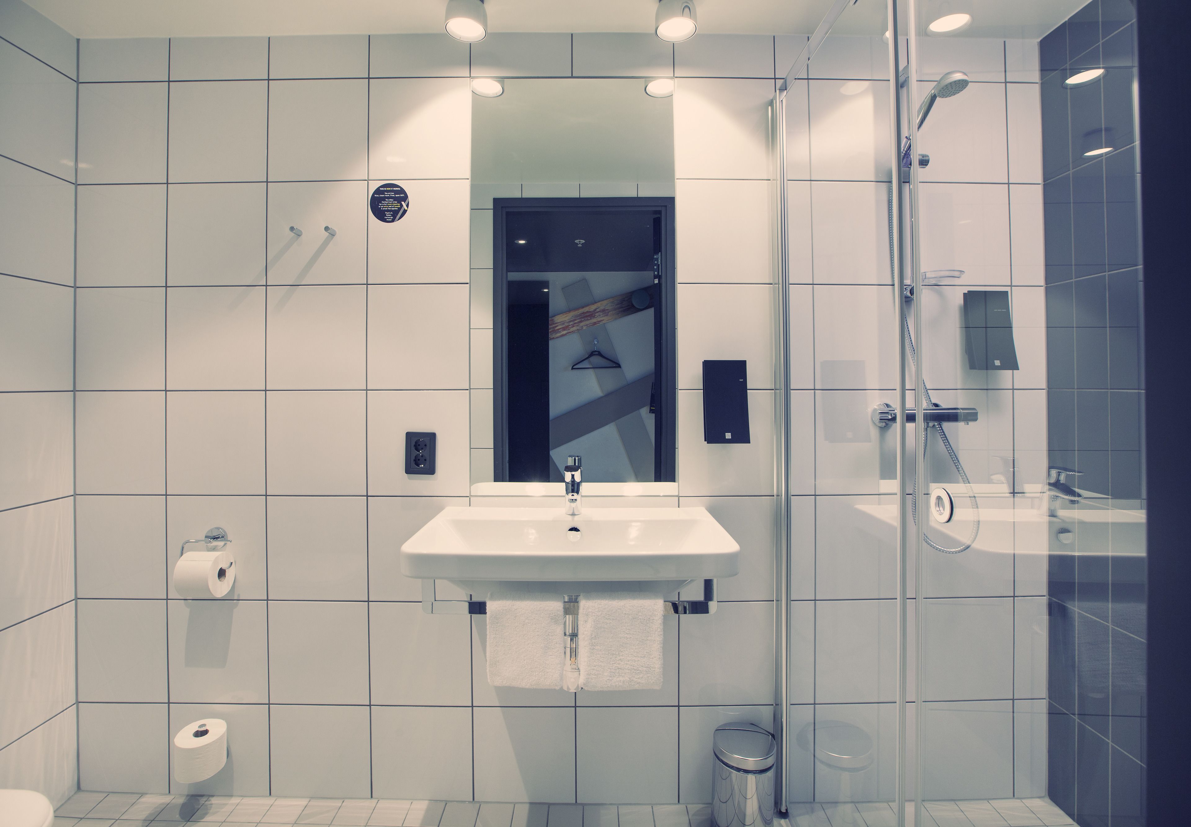 shower, hair dryer, heated floors, towels