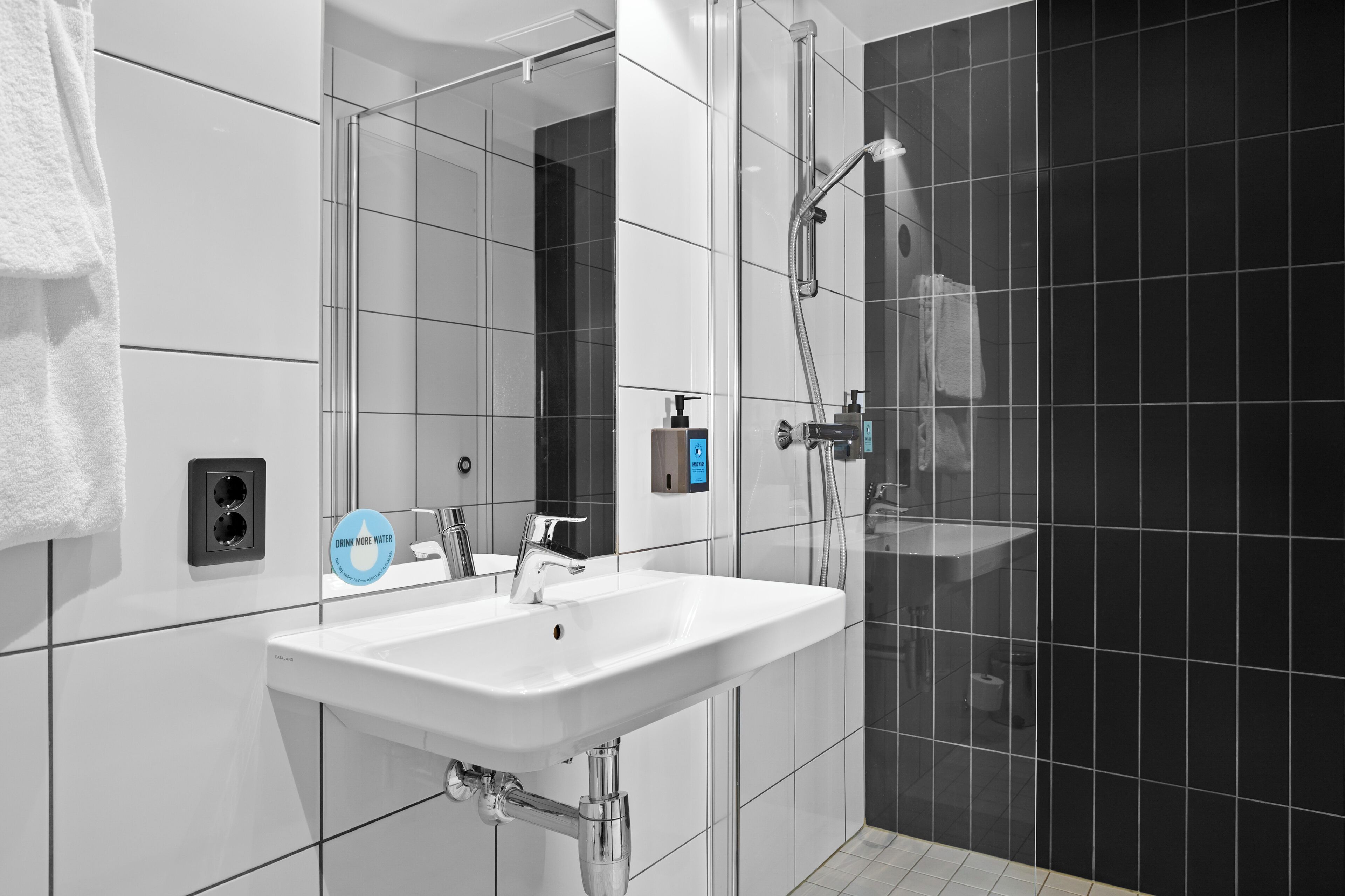 shower, hair dryer, heated floors, towels