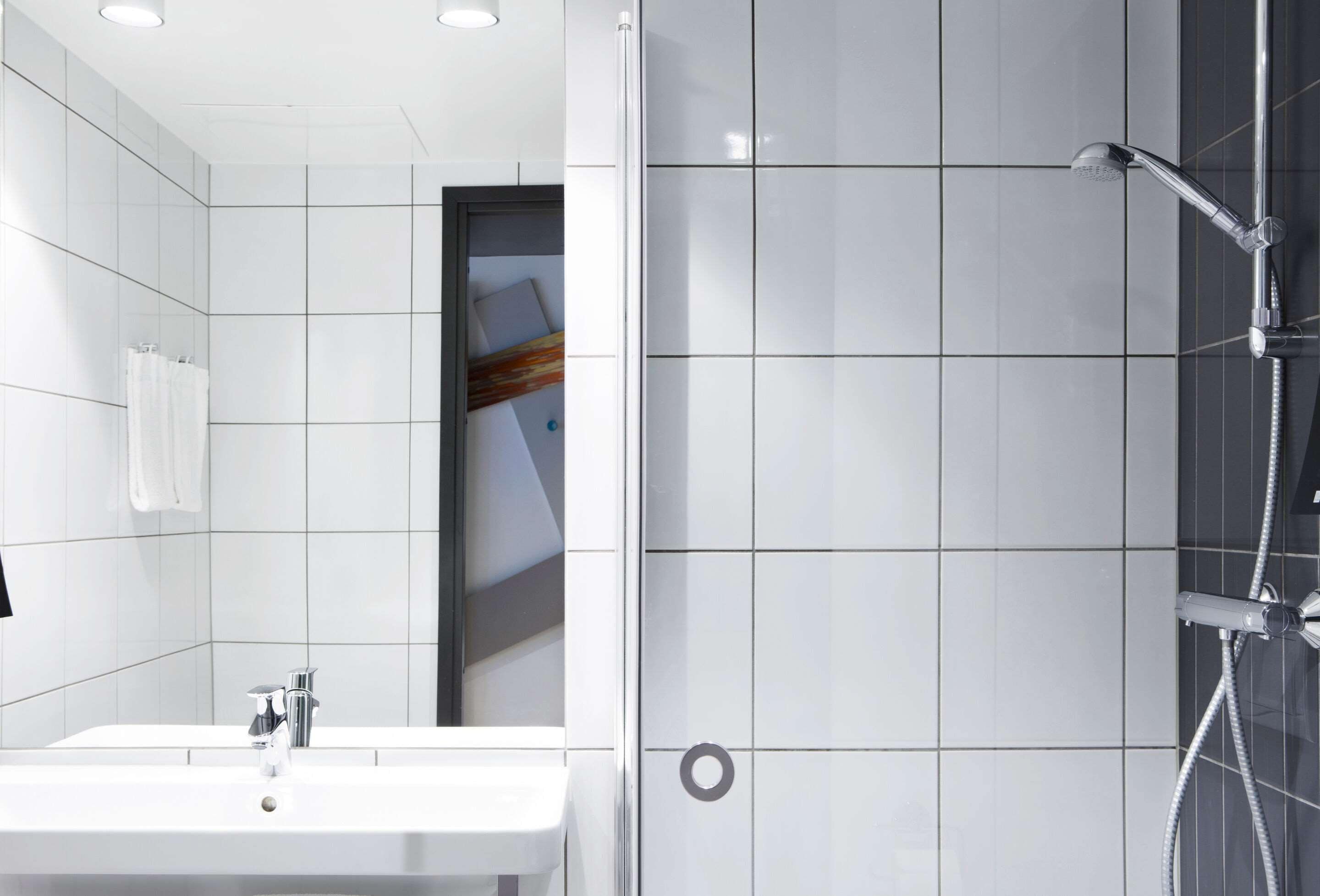 shower, hair dryer, heated floors, towels