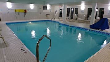 Indoor pool, open 10 AM to 11 PM, pool loungers