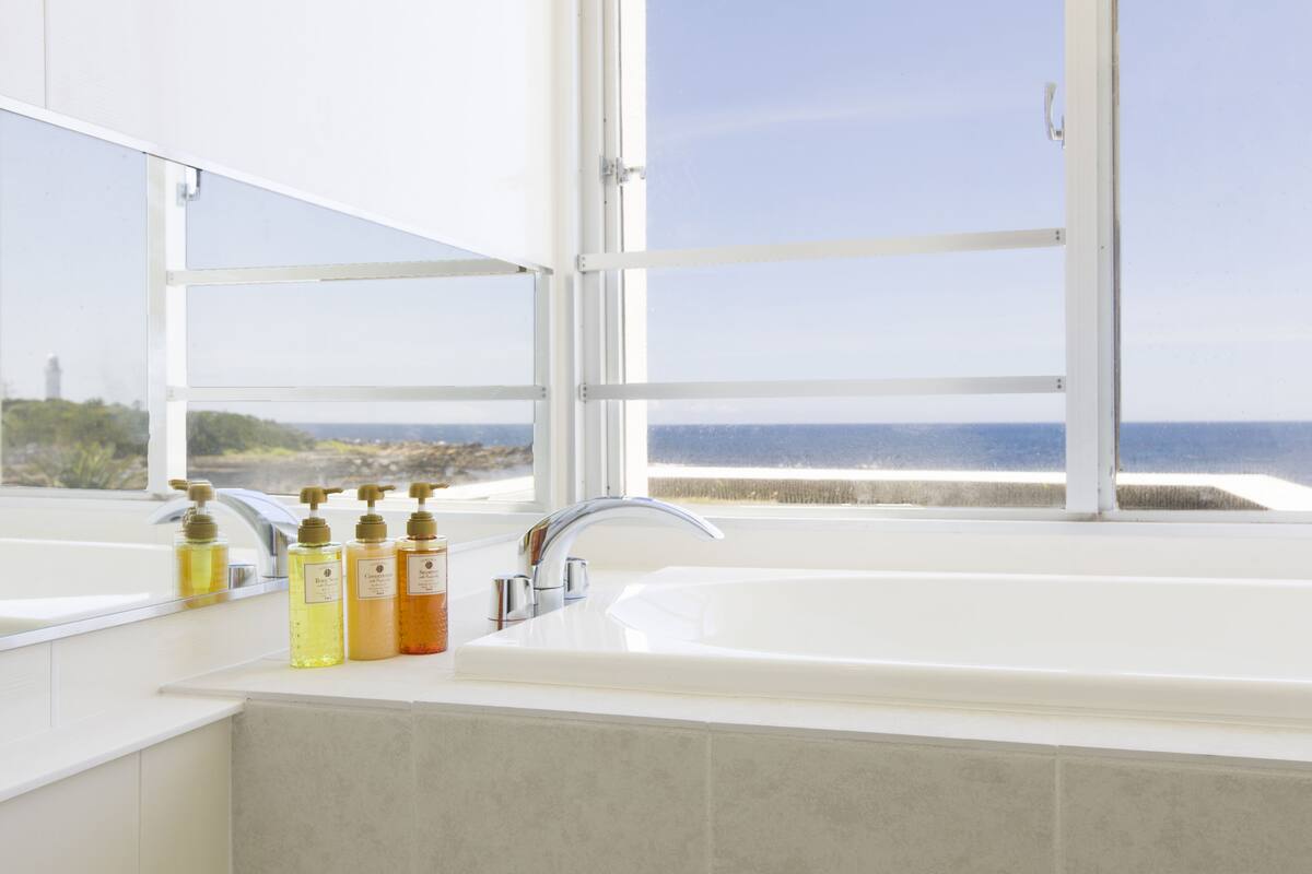 deluxe triple room, non smoking (with view bath) | bathroom | free toiletries, hair dryer, slippers, bidet