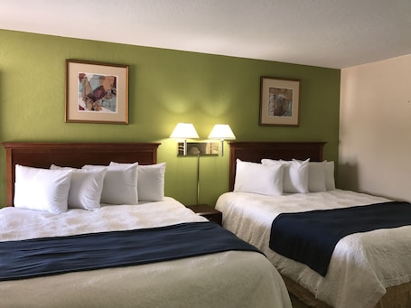 Colchones con pillow-top, escritorio, wifi gratis y ropa de cama