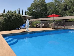 Seasonal outdoor pool, pool umbrellas