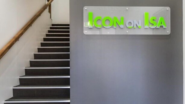 A staircase with a sign that reads "ICON on ISA". - Icon on Isa (Mount Isa City)