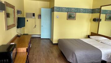 Habitación estándar, 1 cama Queen size | Escritorio, tabla de planchar con plancha, camas extra y wifi gratis