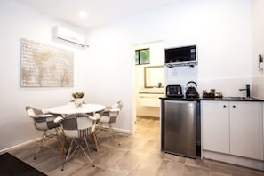 Family Room, 2 Bedrooms | Private kitchen | Fridge, coffee/tea maker