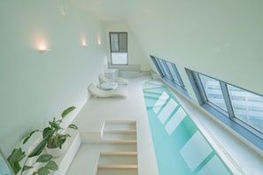 Spa Pool Penthouse | Ropa de cama de alta calidad, edredón, camas con pillow-top y minibar 