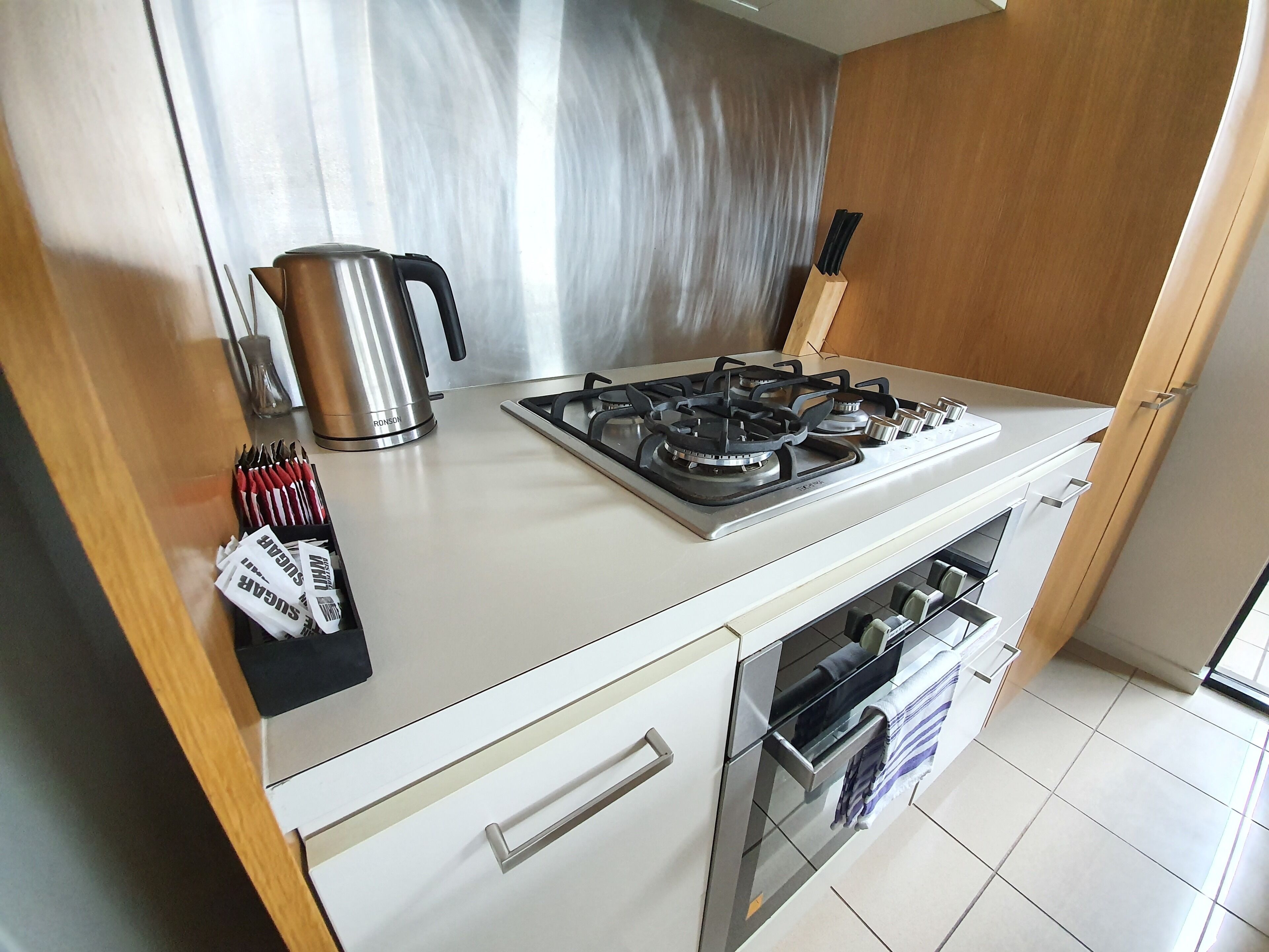 full-sized fridge, microwave, oven, stovetop