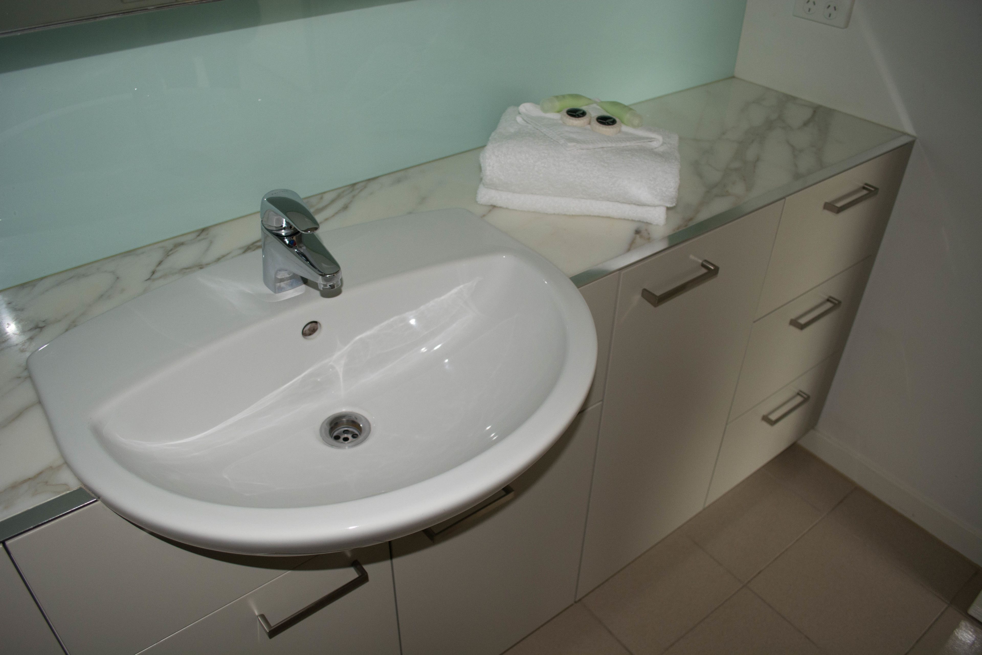 separate bathtub and shower, free toiletries, hair dryer, towels