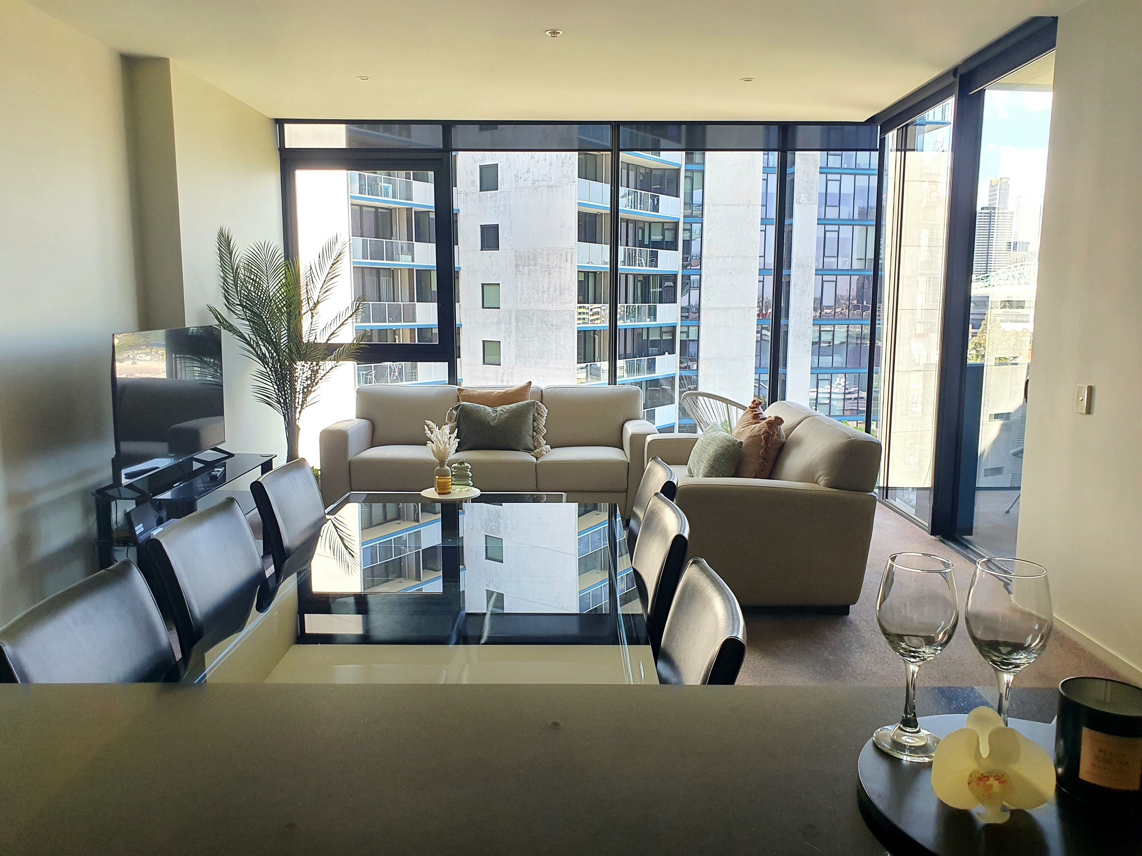 deluxe two bedroom apartment  | living area | 50-inch flat-screen tv with digital channels, tv