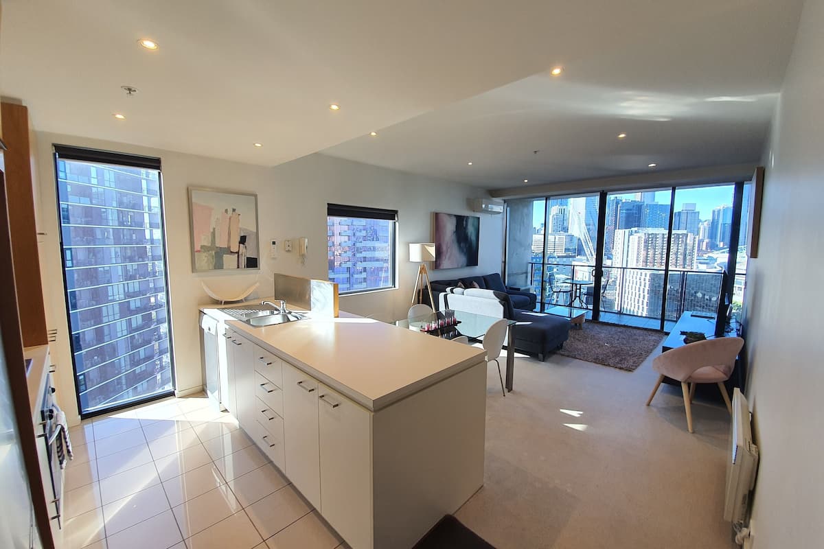 two bedroom apartment | living area | 50-inch flat-screen tv with digital channels, tv