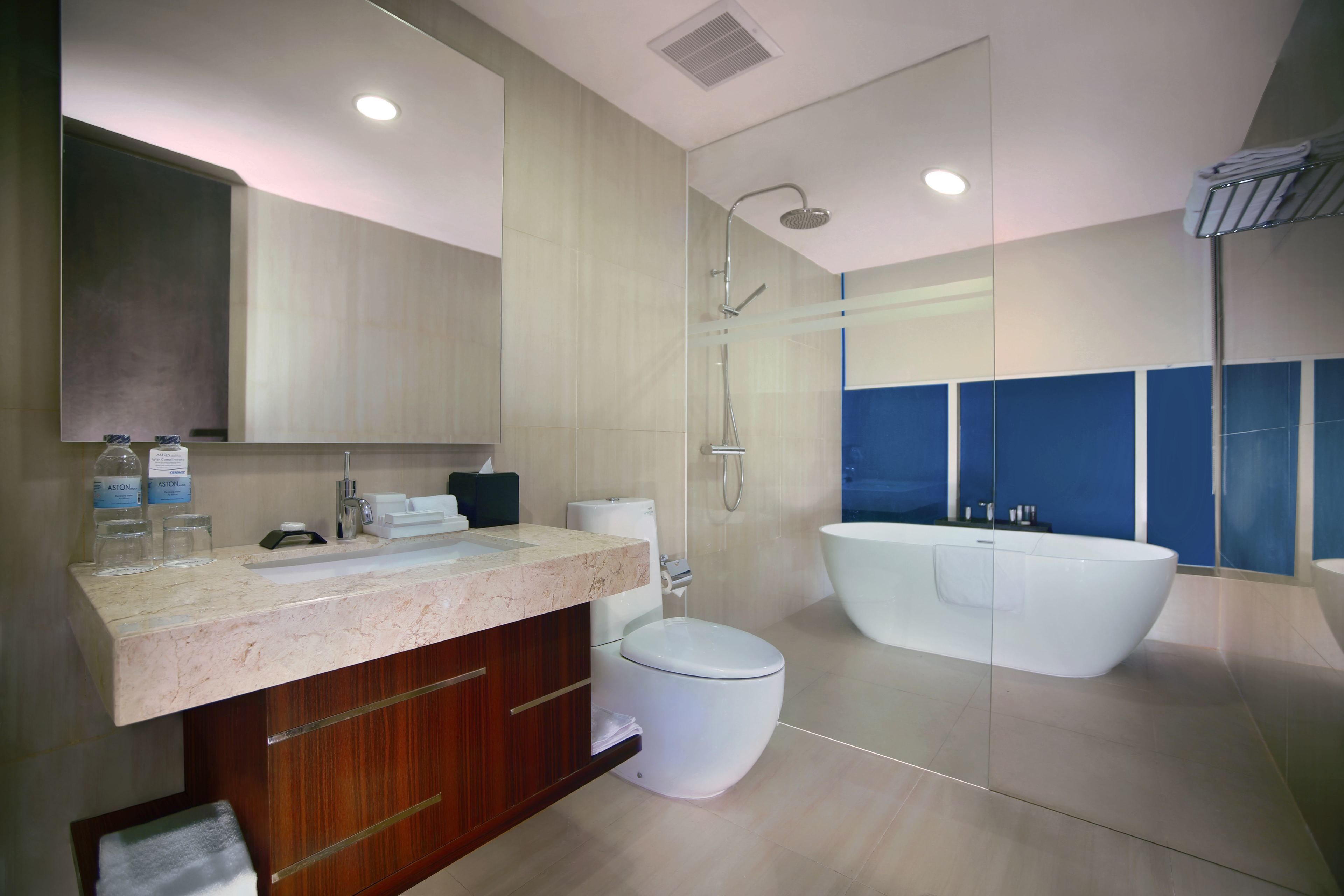 junior suite | bathroom | hair dryer, bathrobes, towels