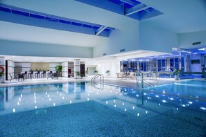 Indoor pool, outdoor pool, pool umbrellas, pool loungers