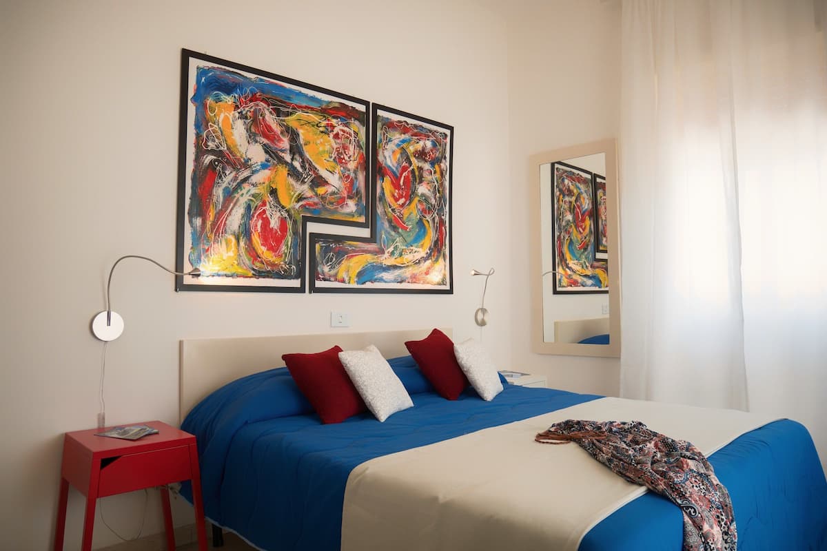 Double Room, Balcony, Garden View | Minibar, individually furnished, desk, laptop workspace