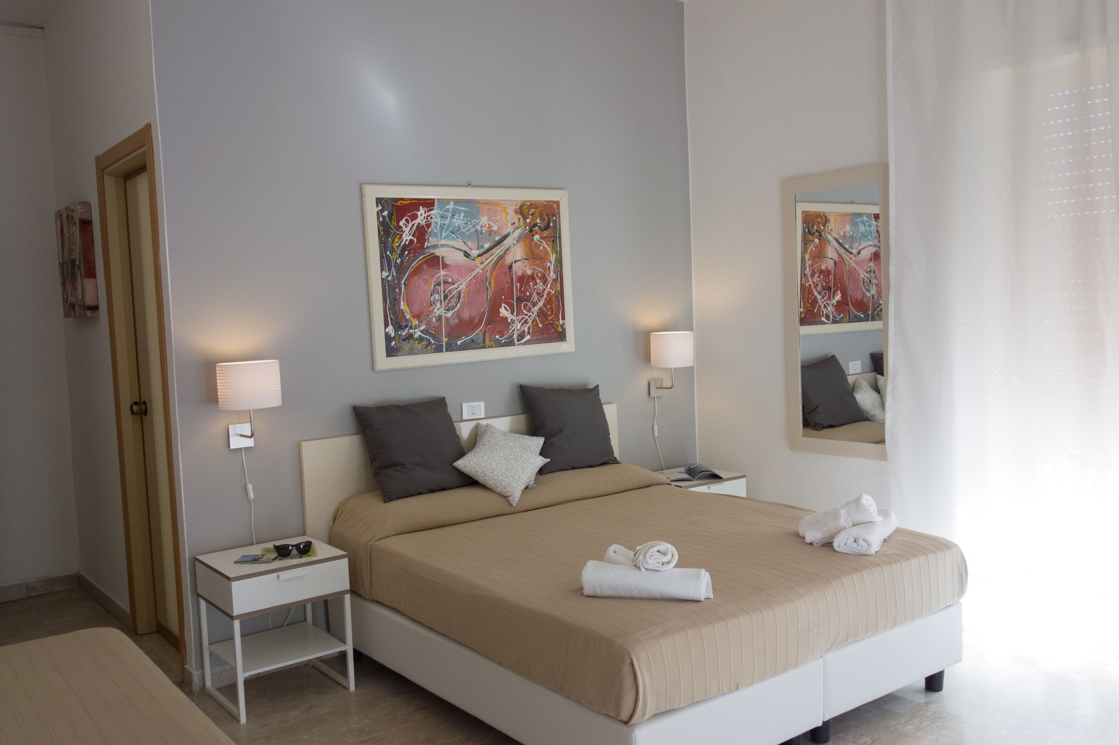 Family Room, Balcony, Mountain View | Minibar, individually furnished, desk, laptop workspace