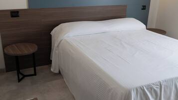 Superior-Einzelzimmer | Daunenbettdecken, Minibar, Zimmersafe, individuell dekoriert