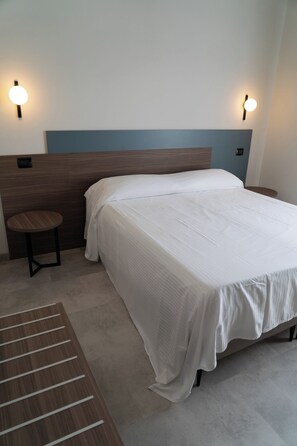 Superior Single Room | Down comforters, minibar, in-room safe, individually decorated - Hotel HDomus (Nogarole Rocca)
