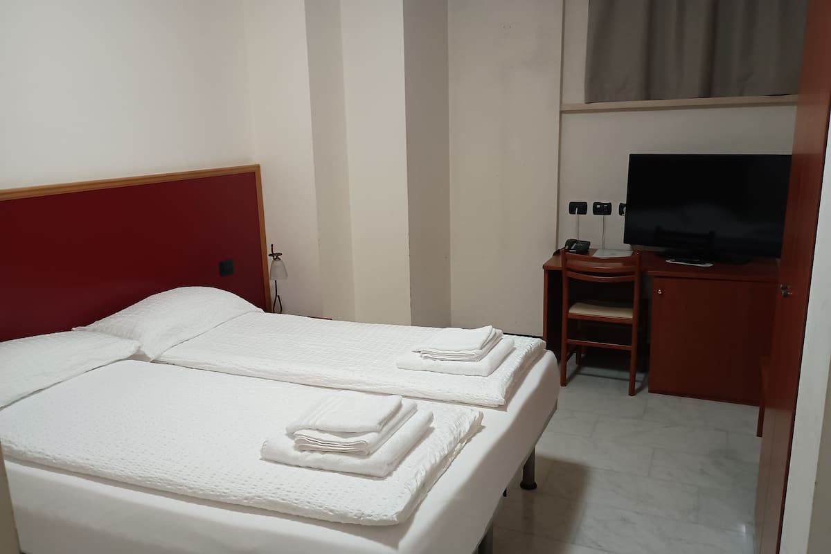 Economy Double or Twin Room, 1 Double Bed | Down comforters, minibar, in-room safe, individually decorated