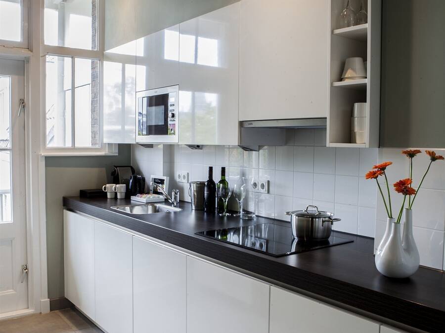 Deluxe Apartment, 2 Bedrooms | Private kitchen | Coffee/tea maker, fridge, microwave, oven