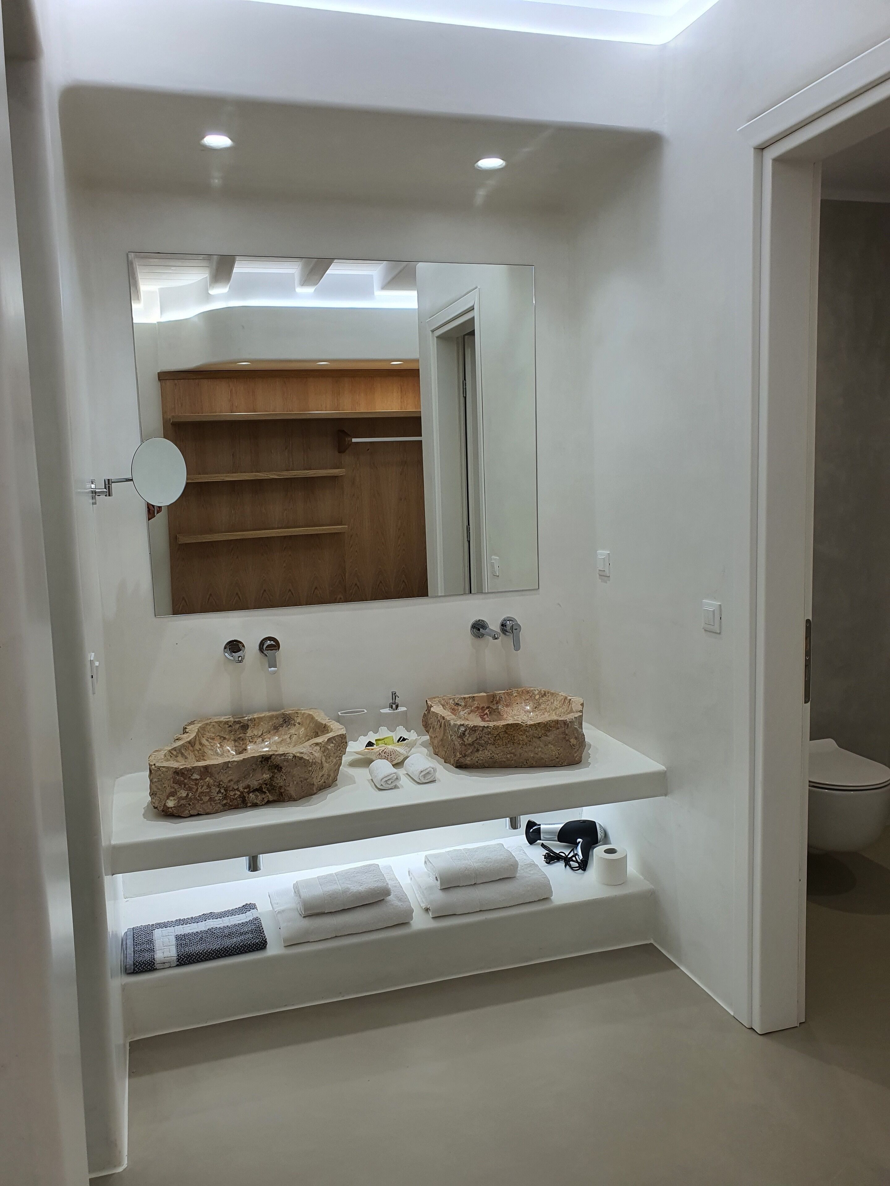 luxury suite | bathroom | shower, free toiletries, hair dryer, slippers