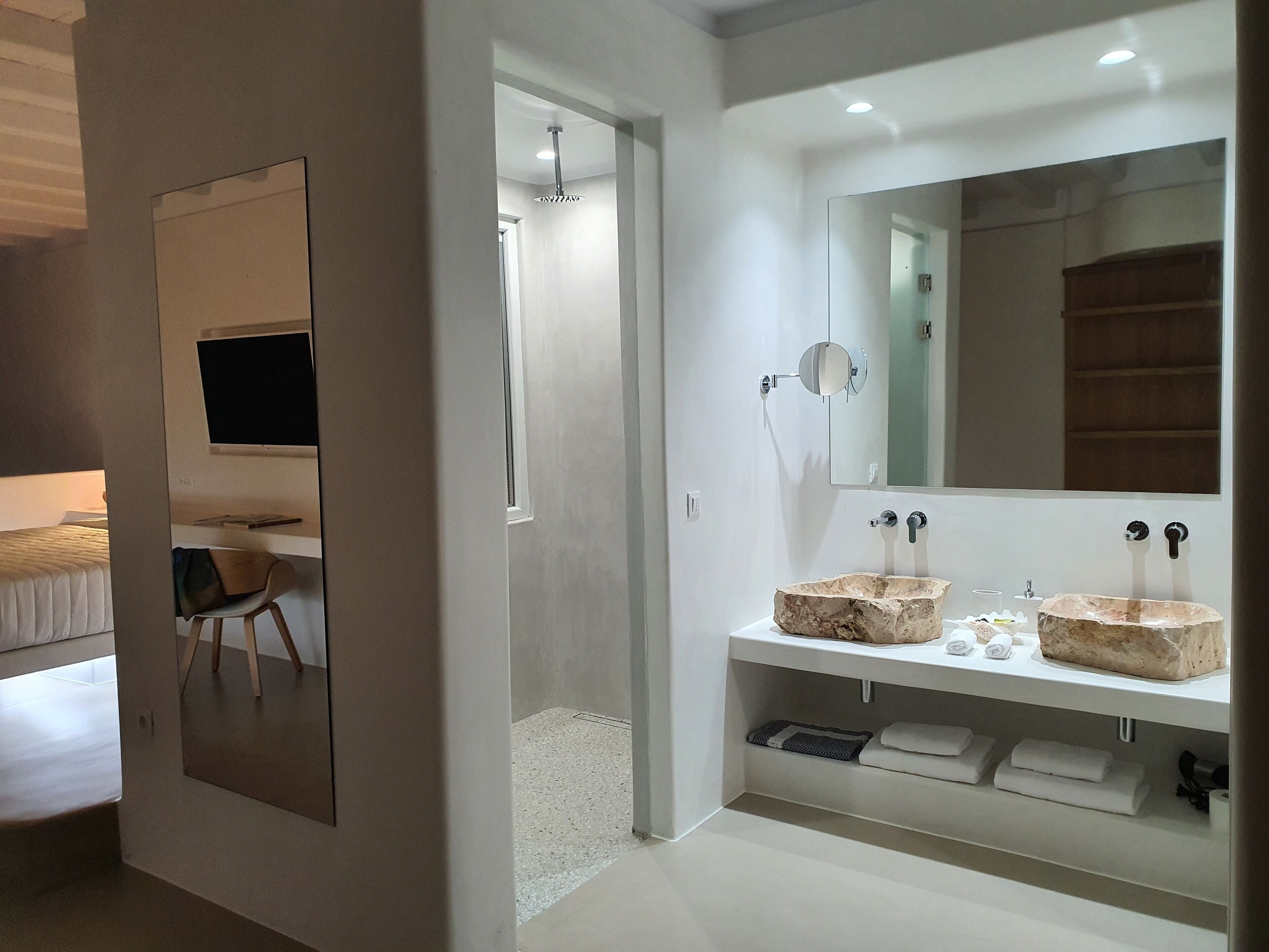 luxury suite | bathroom | shower, free toiletries, hair dryer, slippers
