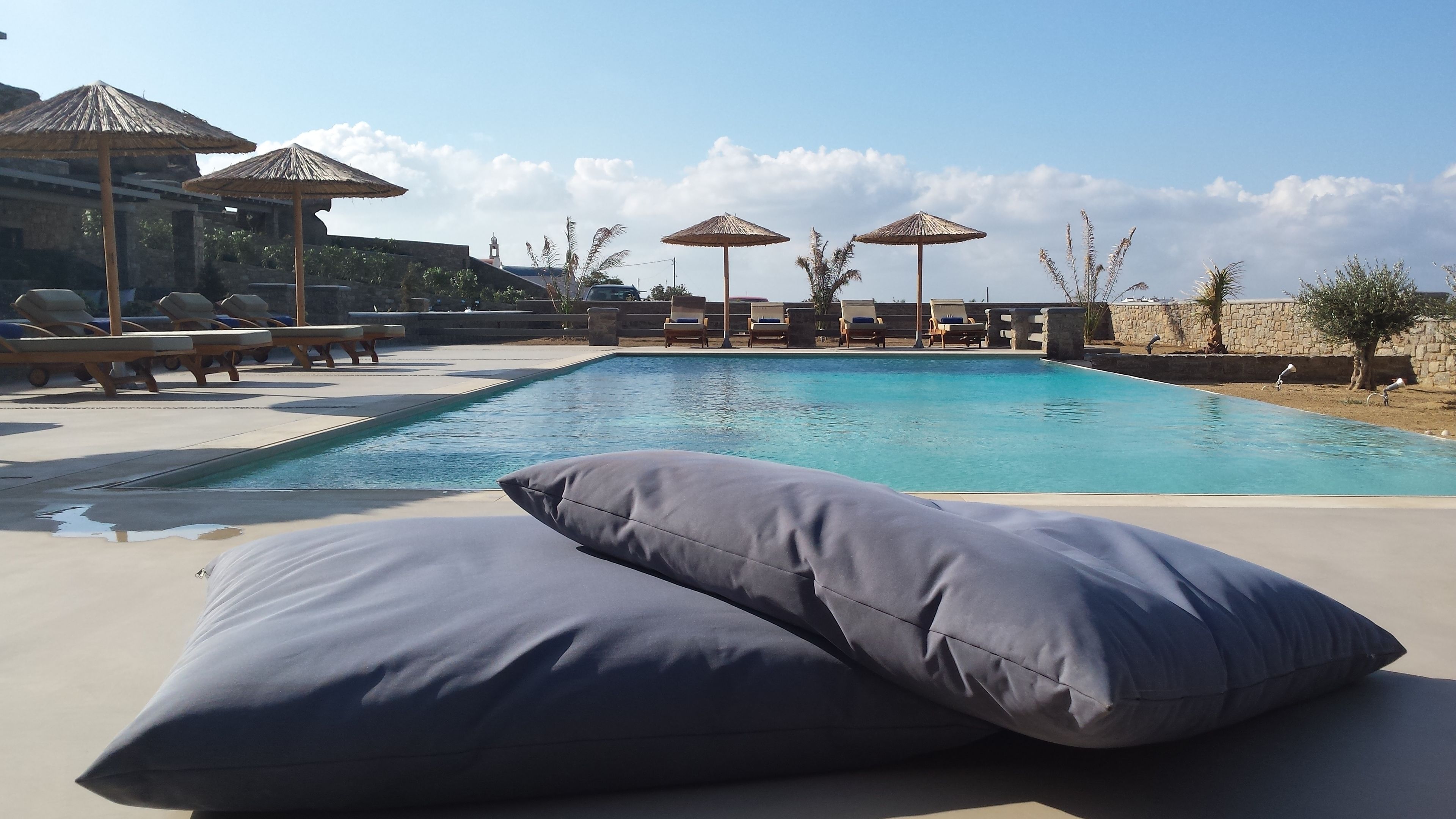 outdoor pool, pool umbrellas, pool loungers