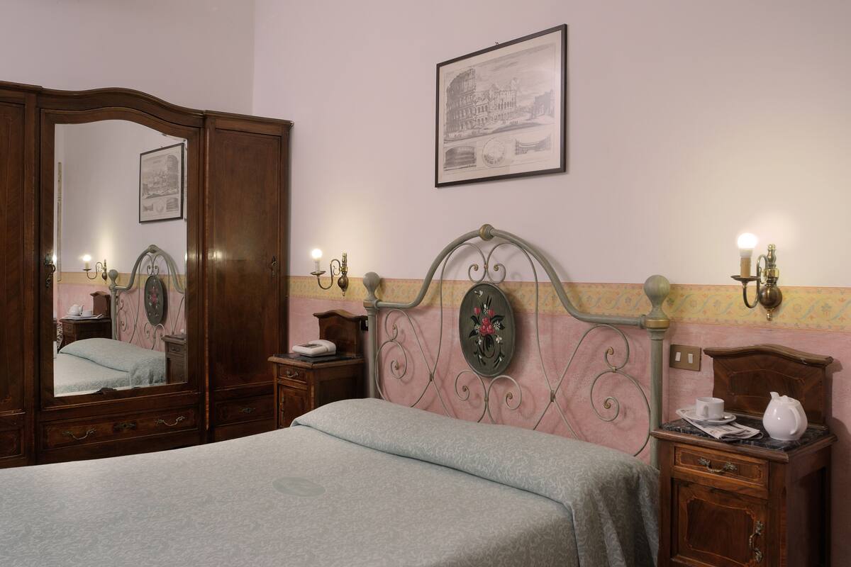Luxe beddengoed, een kluis op de kamer, een strijkplank/strijkijzer