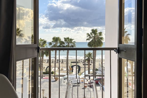 Studio, Partial Sea View | Minibar, desk, laptop workspace, blackout drapes