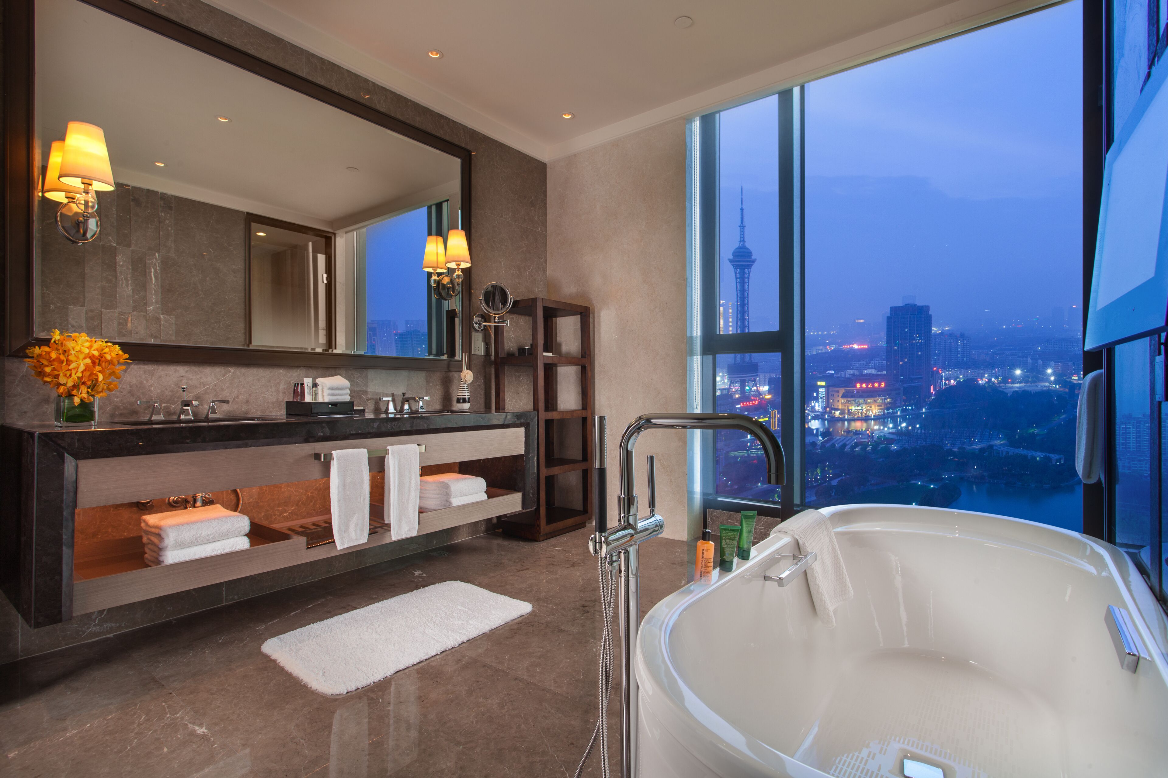 separate bathtub and shower, designer toiletries, hair dryer, bathrobes