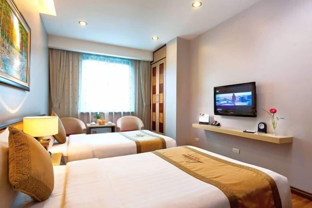 Roupas de cama premium, edredons de pluma, frigobar, cofres nos quartos