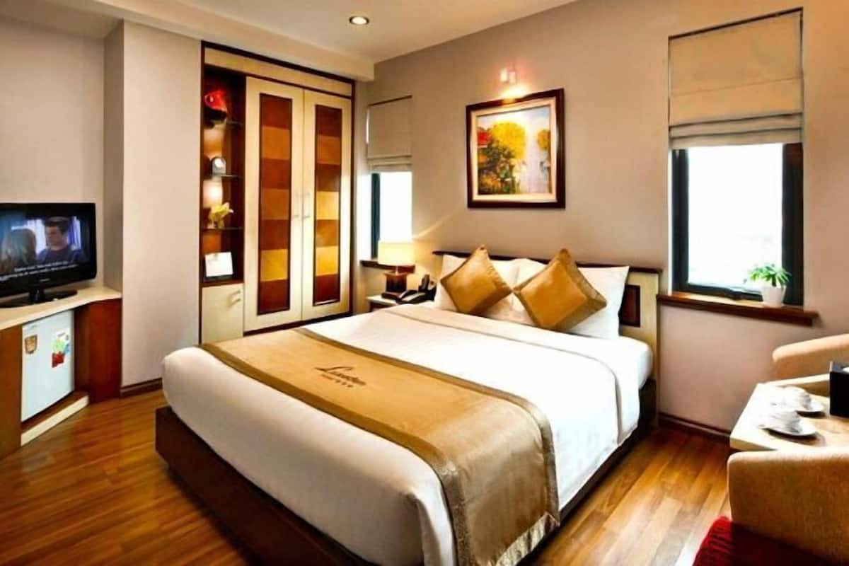 Roupas de cama premium, edredons de pluma, frigobar, cofres nos quartos