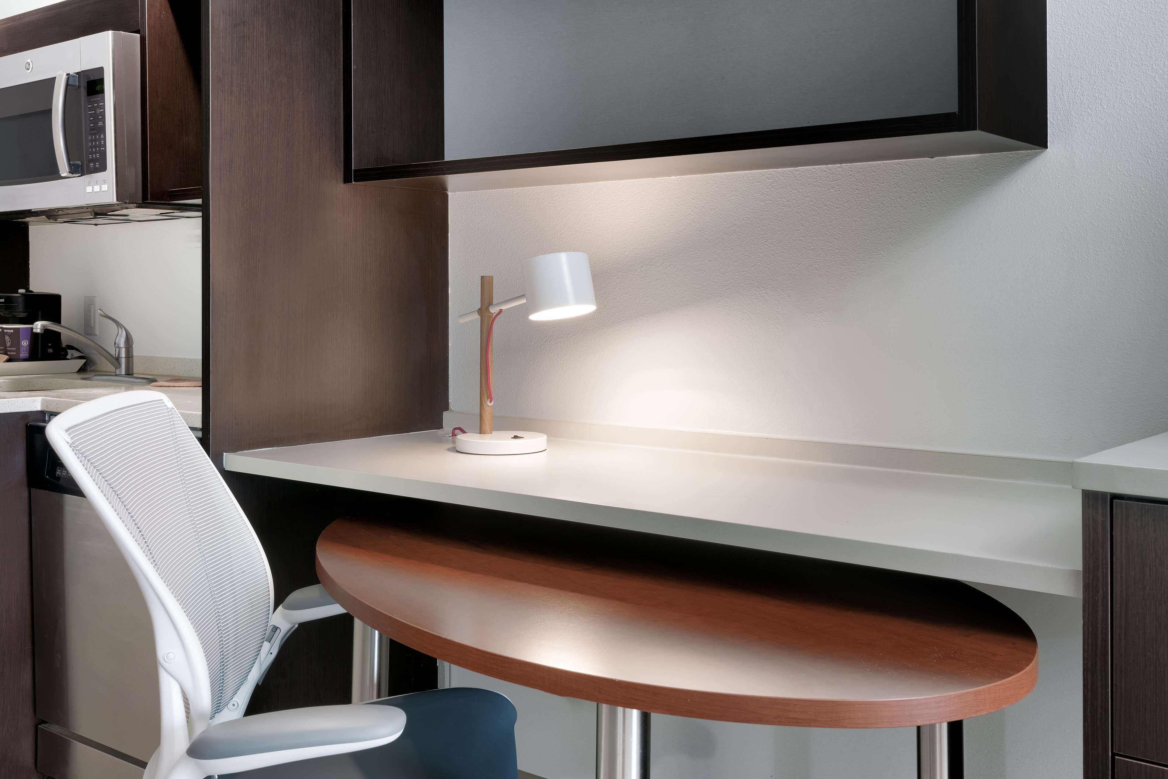 desk, laptop workspace, blackout curtains, iron/ironing board