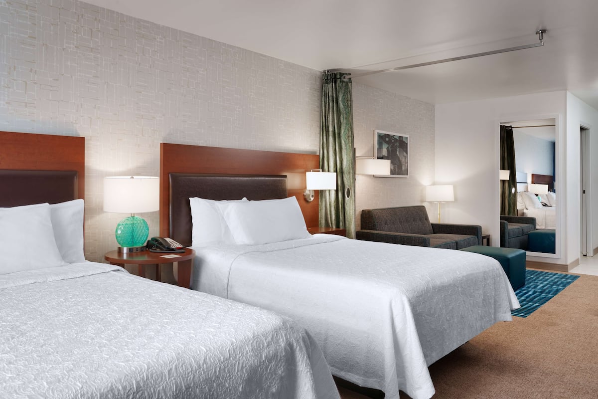 Studio, 2 Queen Beds | Desk, laptop workspace, blackout drapes, iron/ironing board