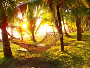 On the beach, sun loungers, beach umbrellas, beach towels