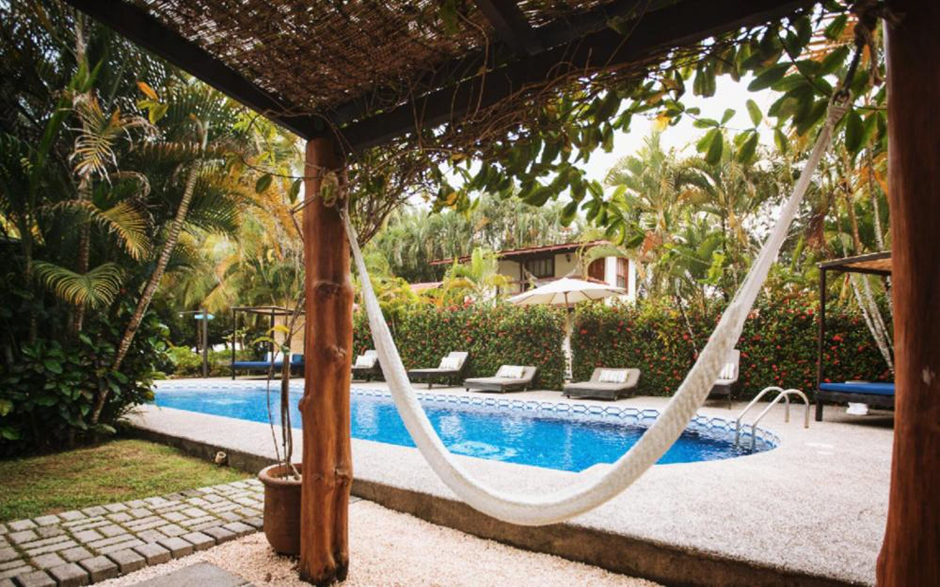 cottage, pool view, poolside | 2 bedrooms, premium bedding, pillow-top beds, in-room safe