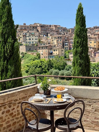 Terraza en la azotea. Villa del Sole Siena