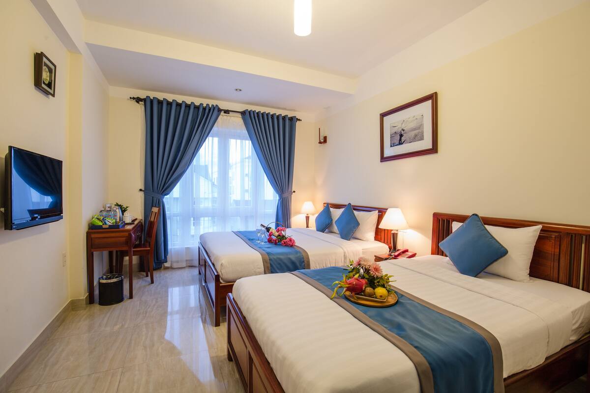Deluxe Room, Multiple Beds, City View | Minibar, in-room safe, desk, WiFi (free)