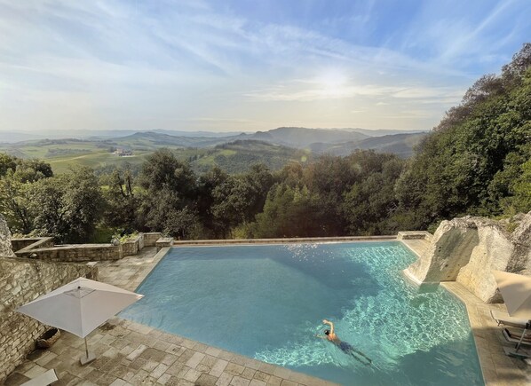 2 outdoor pools, pool umbrellas, sun loungers