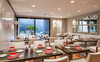 Daily buffet breakfast (EUR 18.5 per person)