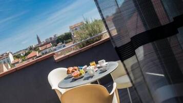 Junior Suite with Terrace | 1 bedroom, premium bedding, minibar, in-room safe