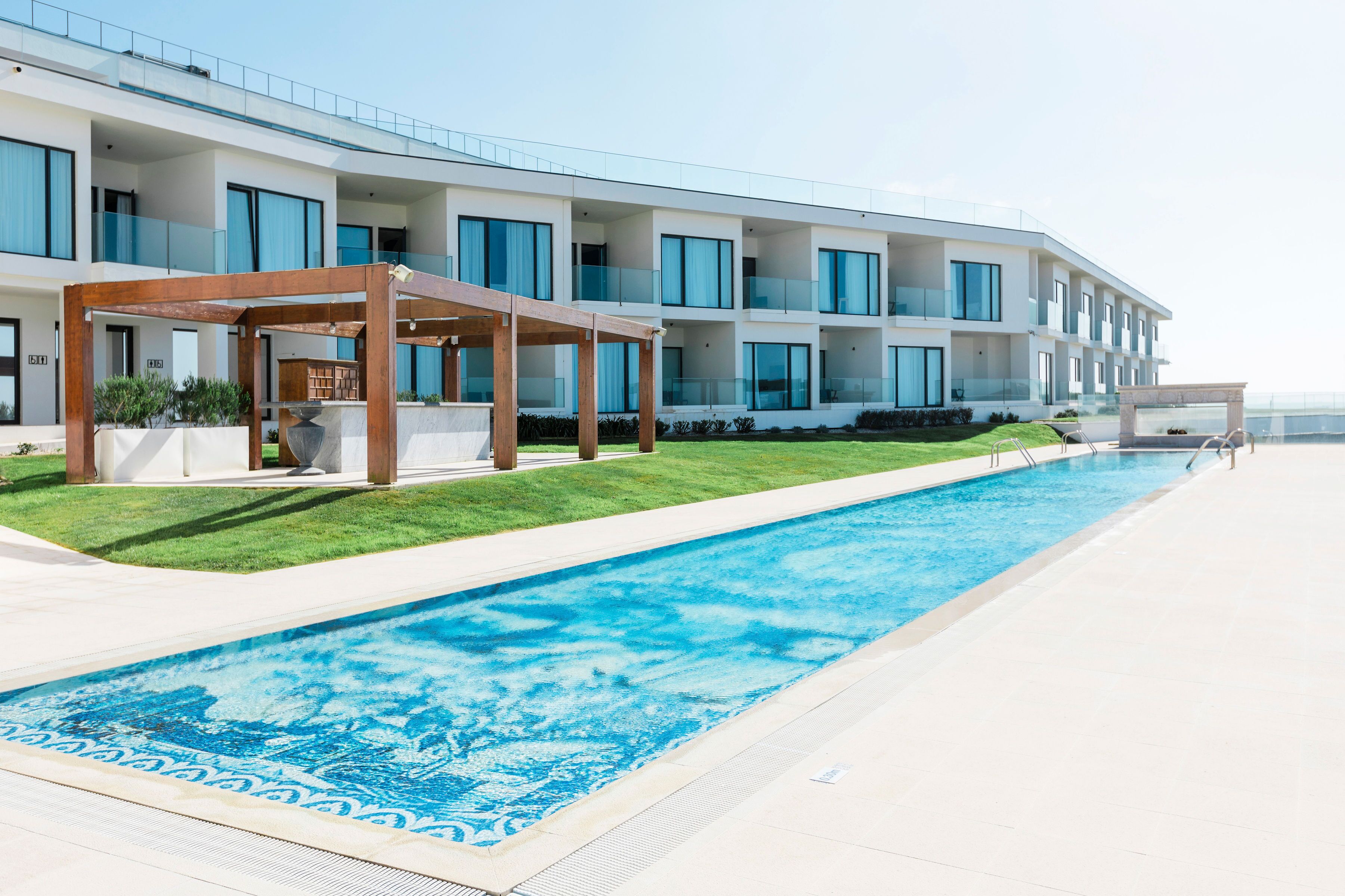 Indoor pool, outdoor pool, open 9:00 AM to 2:00 PM, pool umbrellas