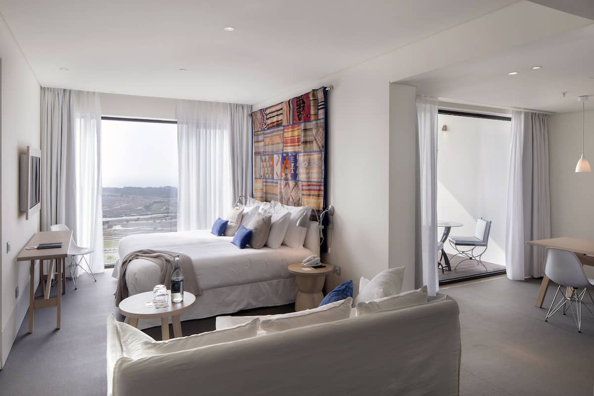 superior suite, 1 bedroom, terrace, golf view | in-room safe, desk, blackout curtains, soundproofing