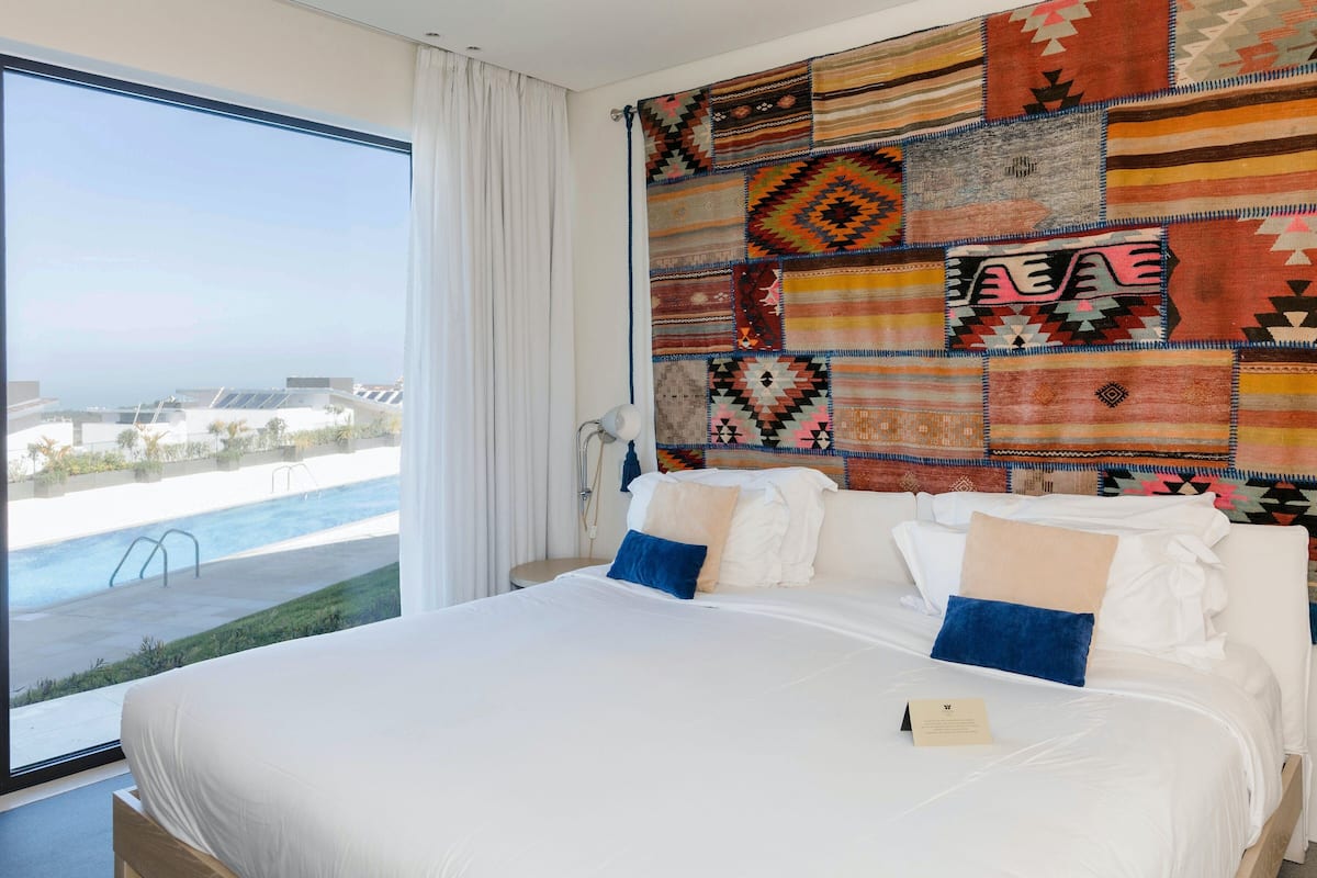 deluxe double or twin room, balcony, golf view | in-room safe, desk, blackout curtains, soundproofing